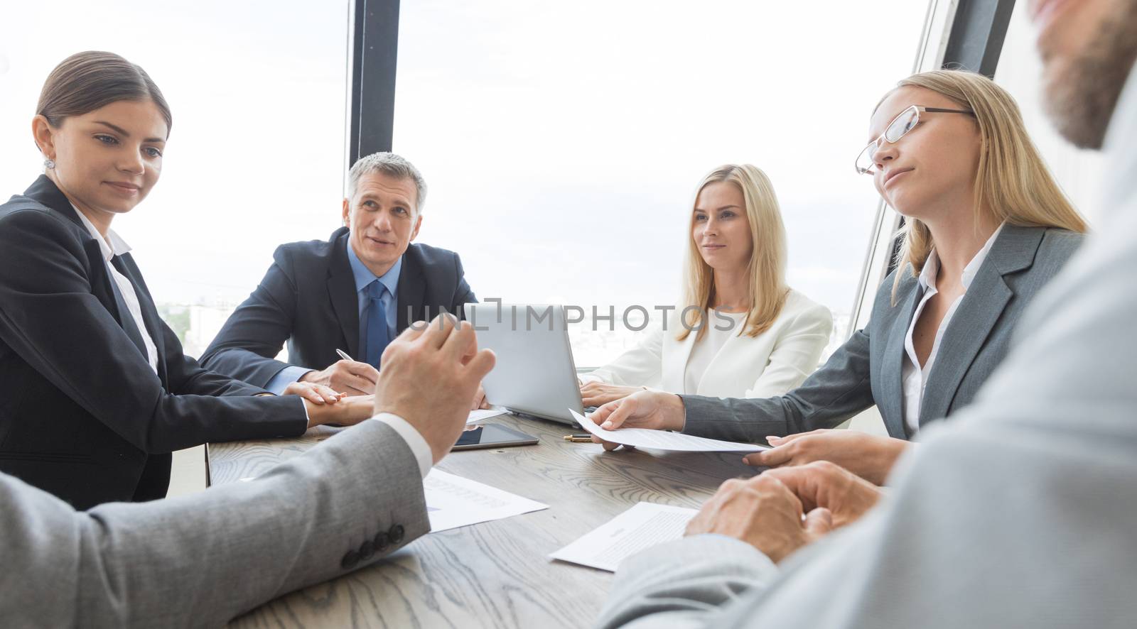 Business people discussing a finance by Yellowj