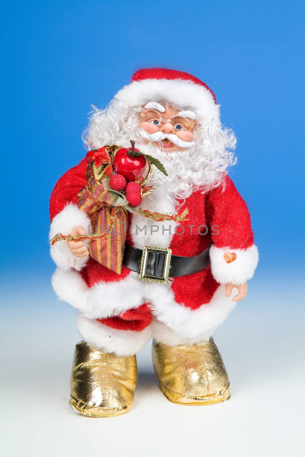 Santa Klaus statuette on a studio background
