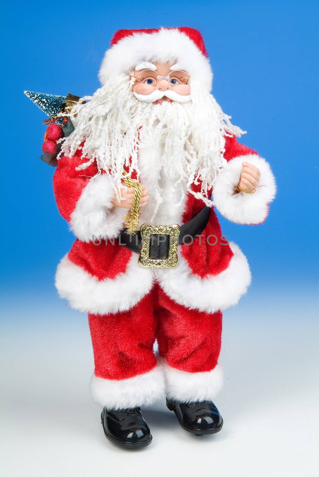 Santa Klaus statuette on a studio background