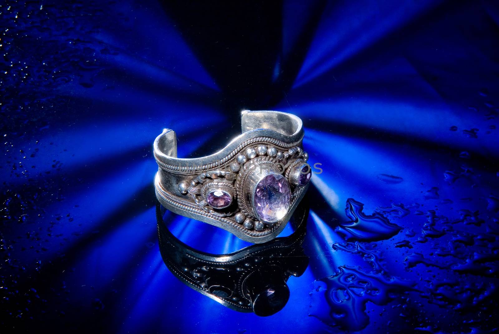 Jewelry on a glass studio background