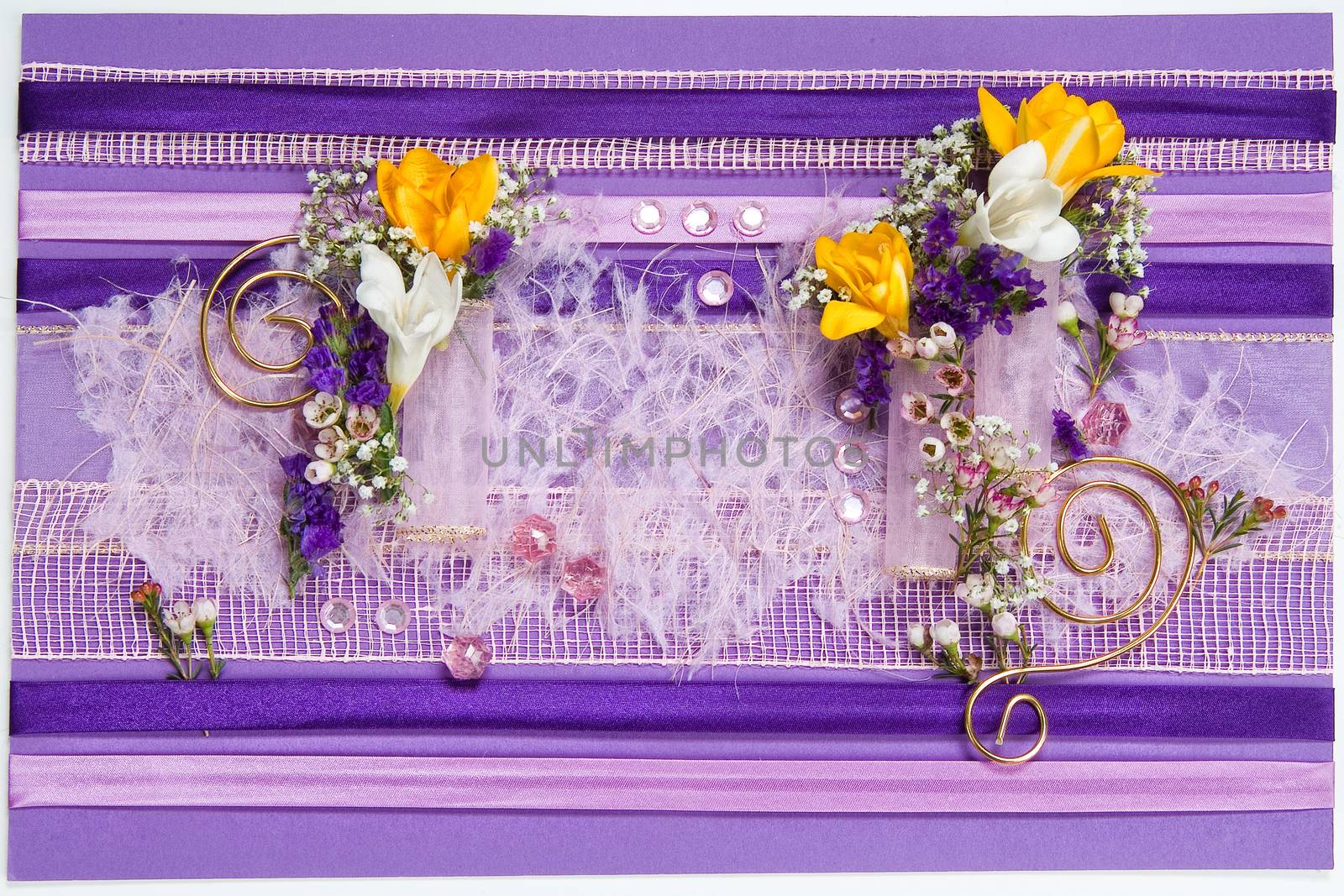 Still life with bouquet of flowers and accessories on a studio background