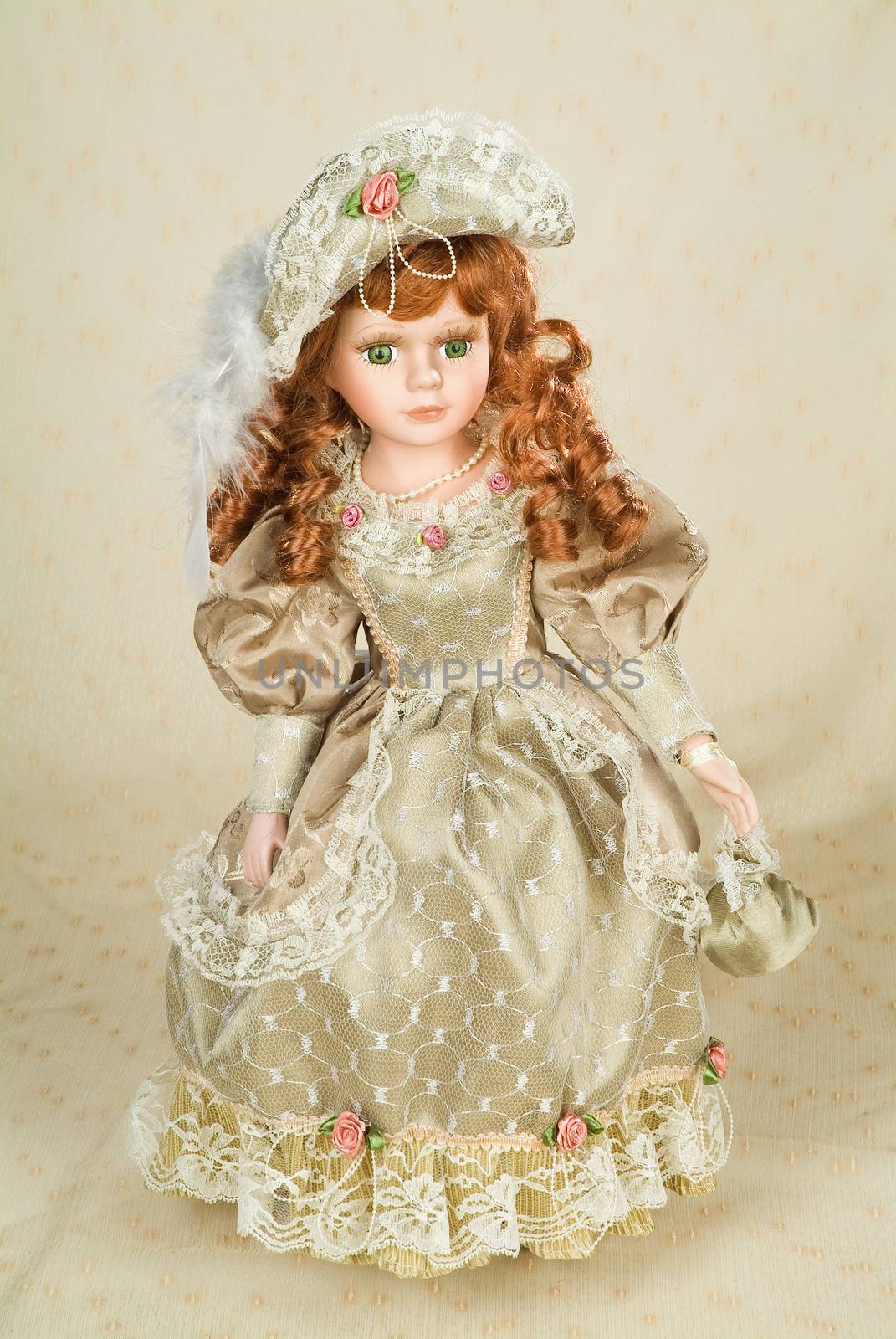 Doll dressed in retro style on a studio background