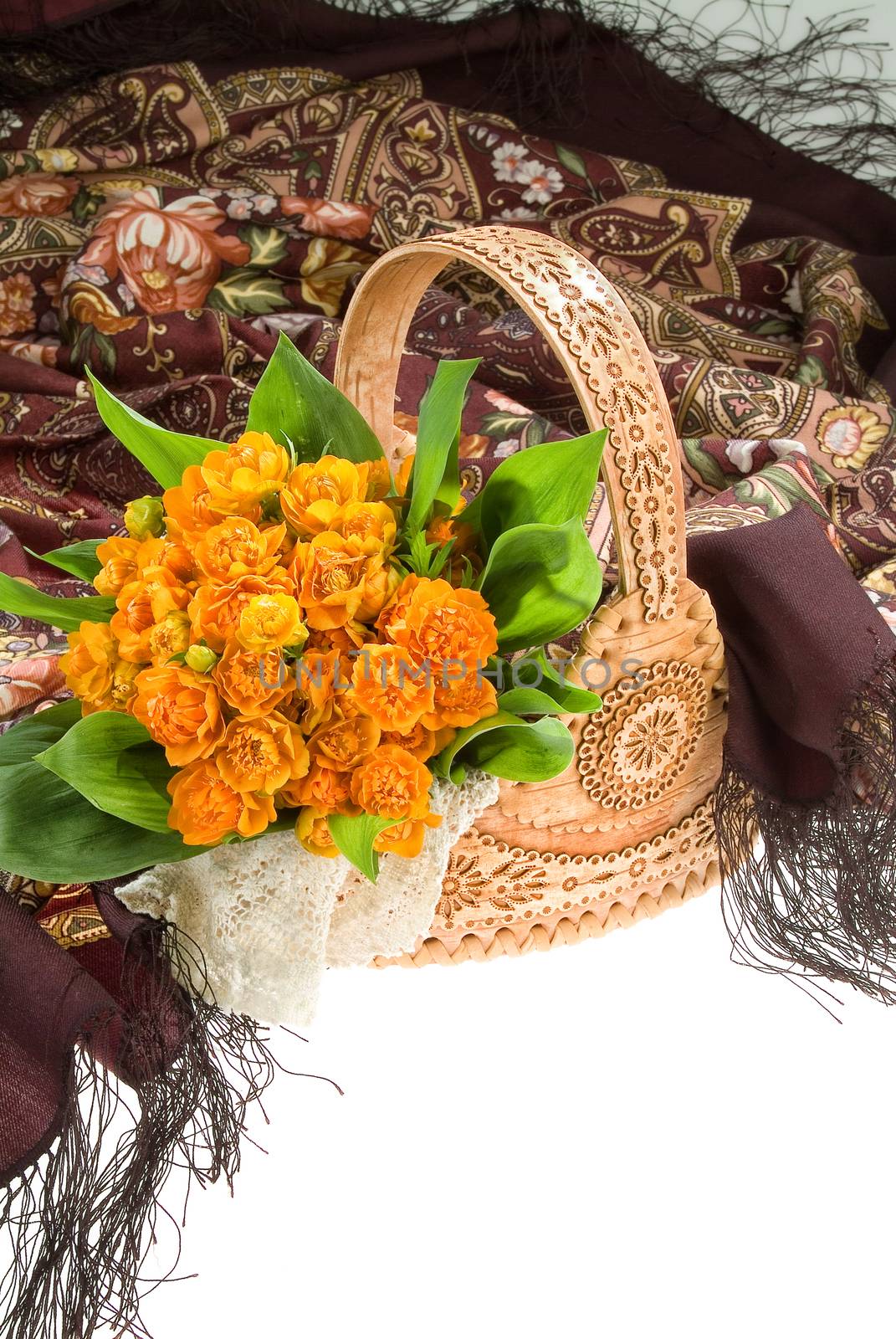 Still life with bouquet of flowers and accessories on a studio background