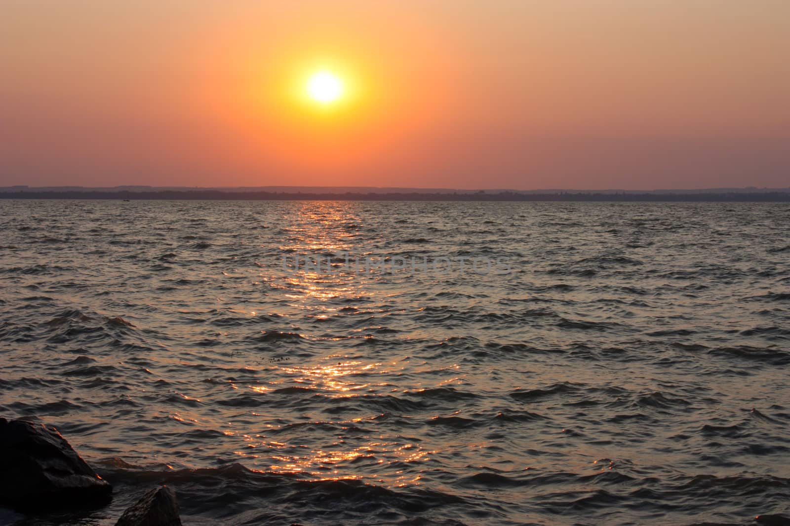 vivid sunset over the Balaton Lake, Hungary