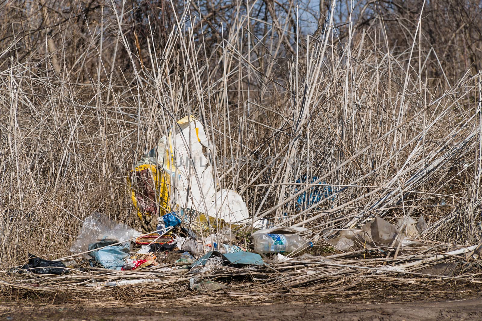 Trash on the agriculture field. Ecology problem and big harm to nature. 