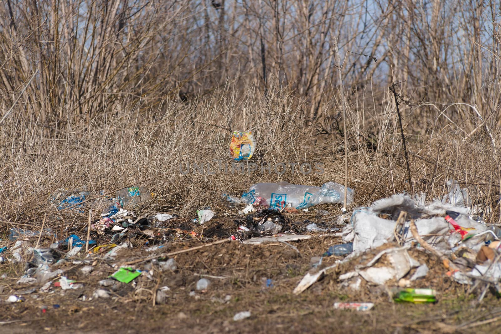 Trash on the agriculture field. Ecology problem and big harm to nature. 