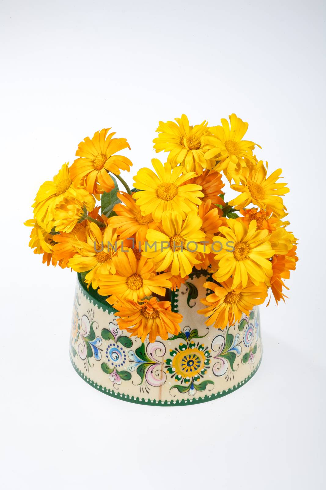 Still life with bouquet of flowers and accessories on a studio background