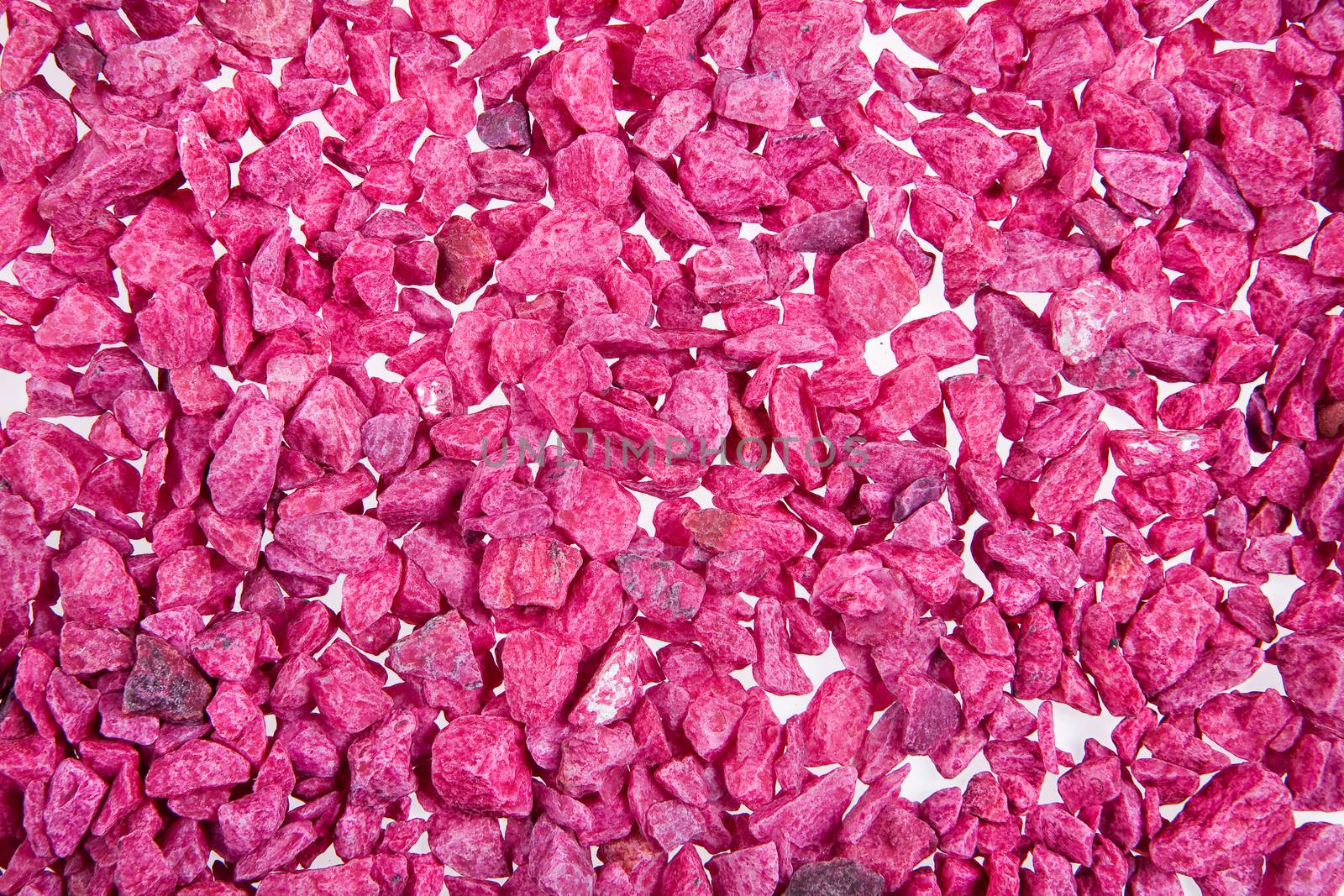 Little coloured stones on isolated background