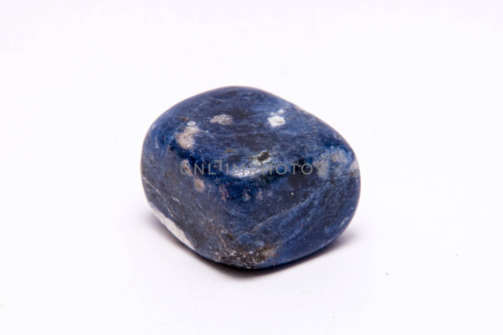 Sodalite gemstone different tones of blue white and black