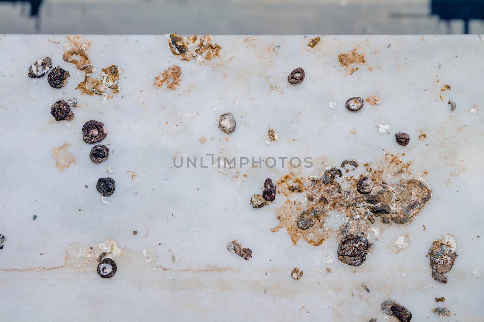 Pigeon droppings on the windowsill. Top view flat lay.