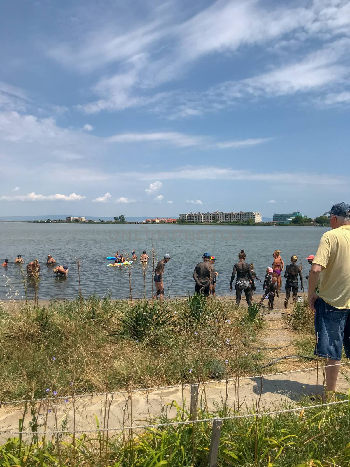 Pomorie, Bulgaria - July 05, 2019: People Visit Lake Pomorie. It Is An Natural Lagoon Which Is Also The Northernmost Lake Of The Burgas Lake Group.