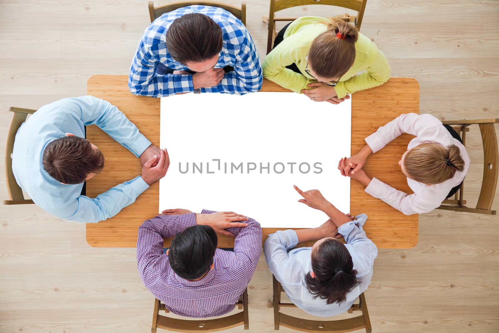 Hipster business teamwork brainstorming planning meeting concept, people team sitting around the table with white paper and pointing, copy space for content