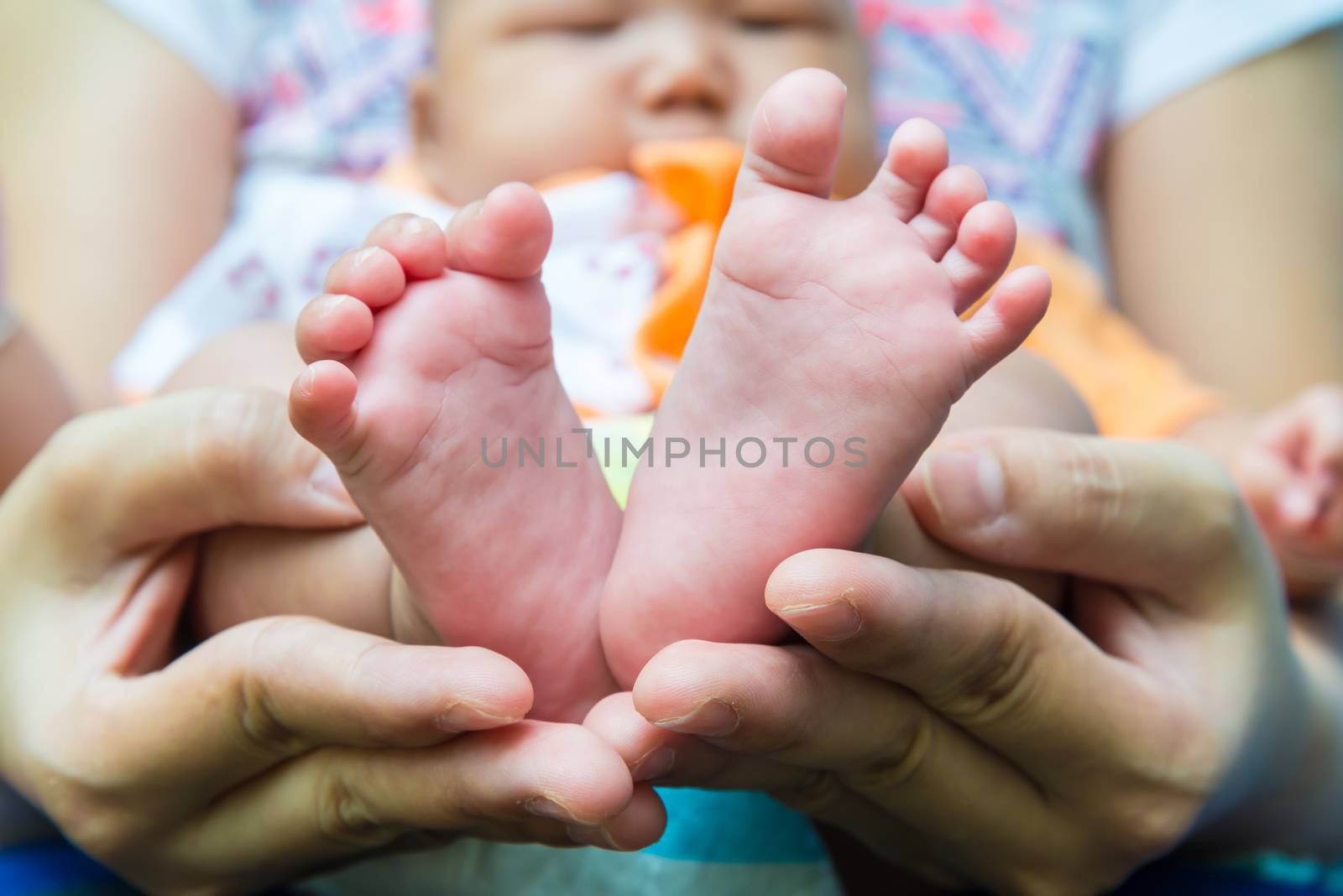 Baby feet by watcharapol