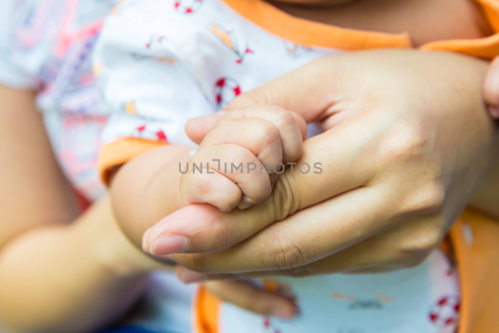 A handful of baby's fingers, concept of love and family,sensitive focus