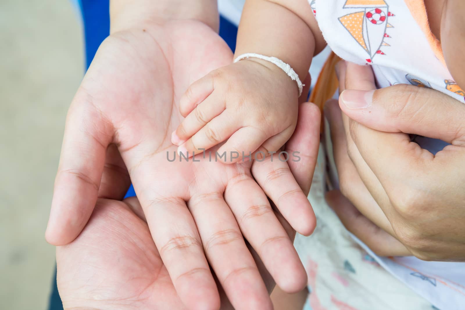 A handful of baby's fingers, concept of love and family,sensitive focus