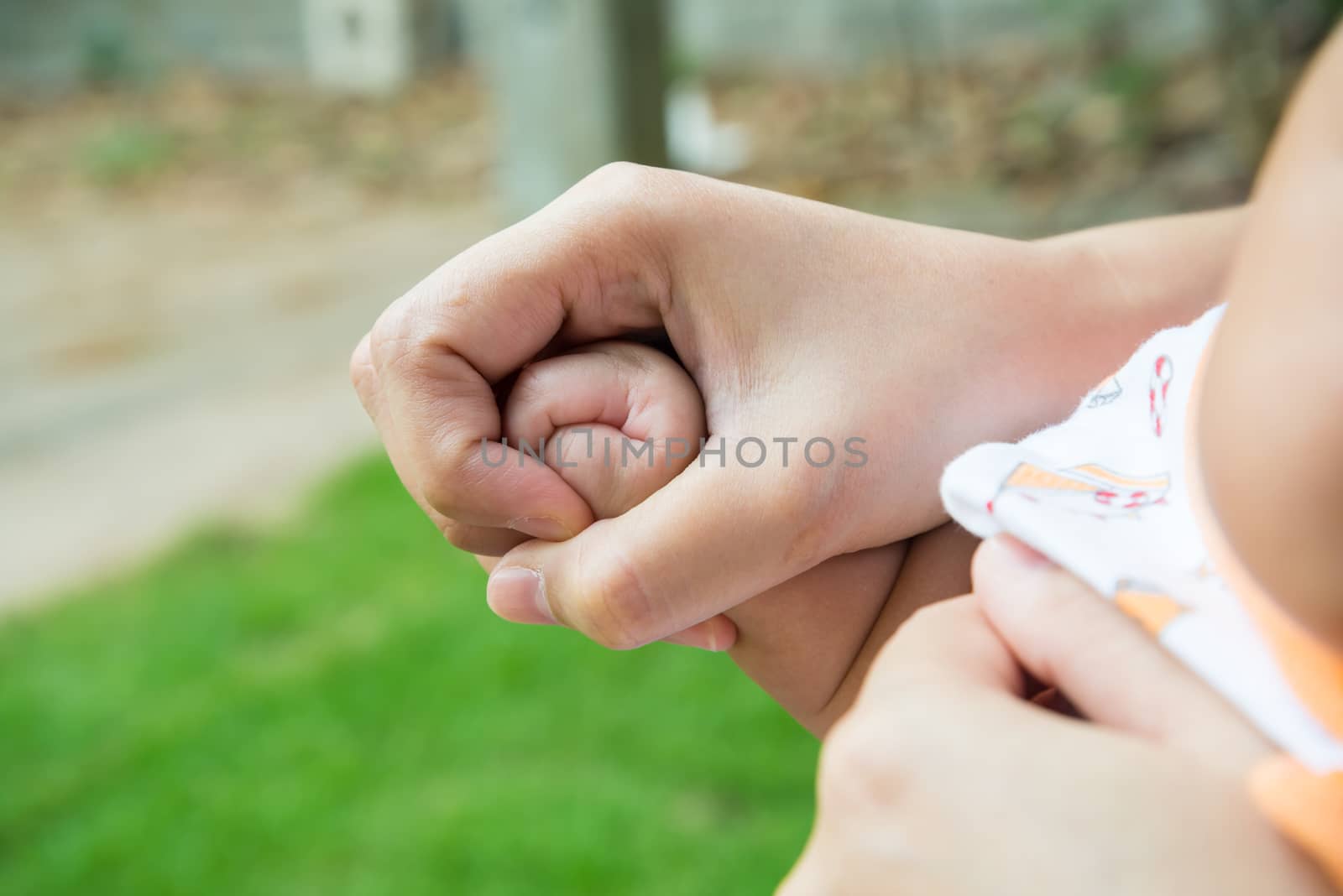 A handful of baby's fingers, concept of love and family,sensitive focus