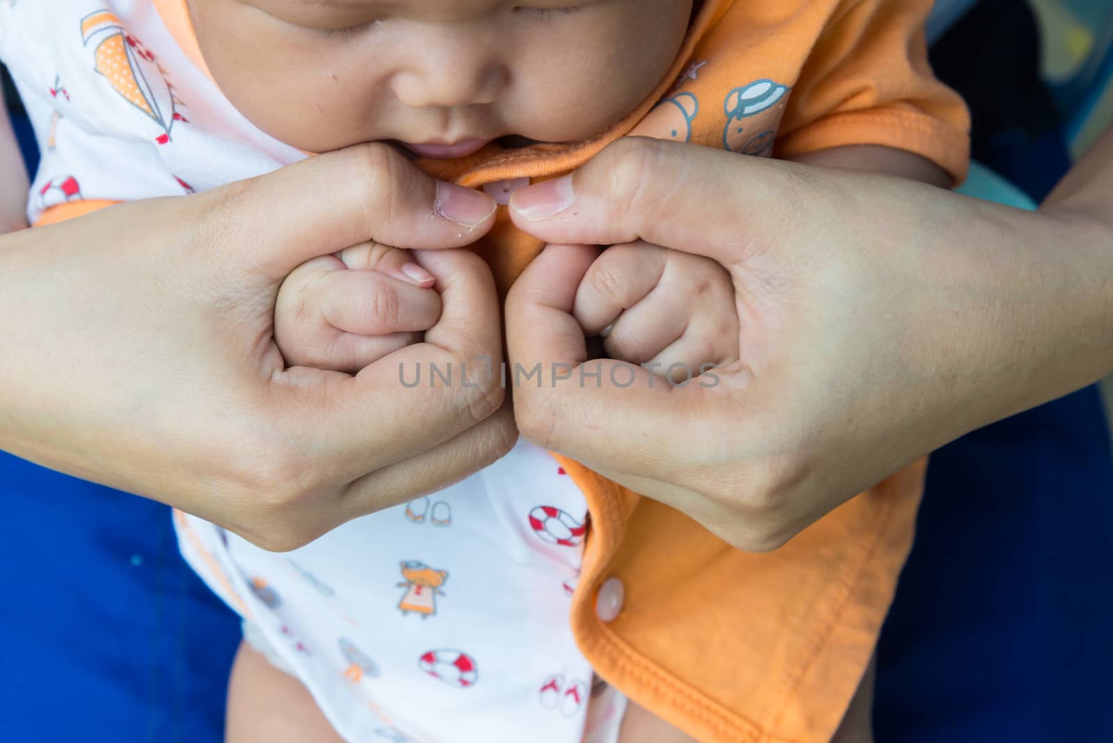 A handful of baby's fingers, concept of love and family,sensitive focus