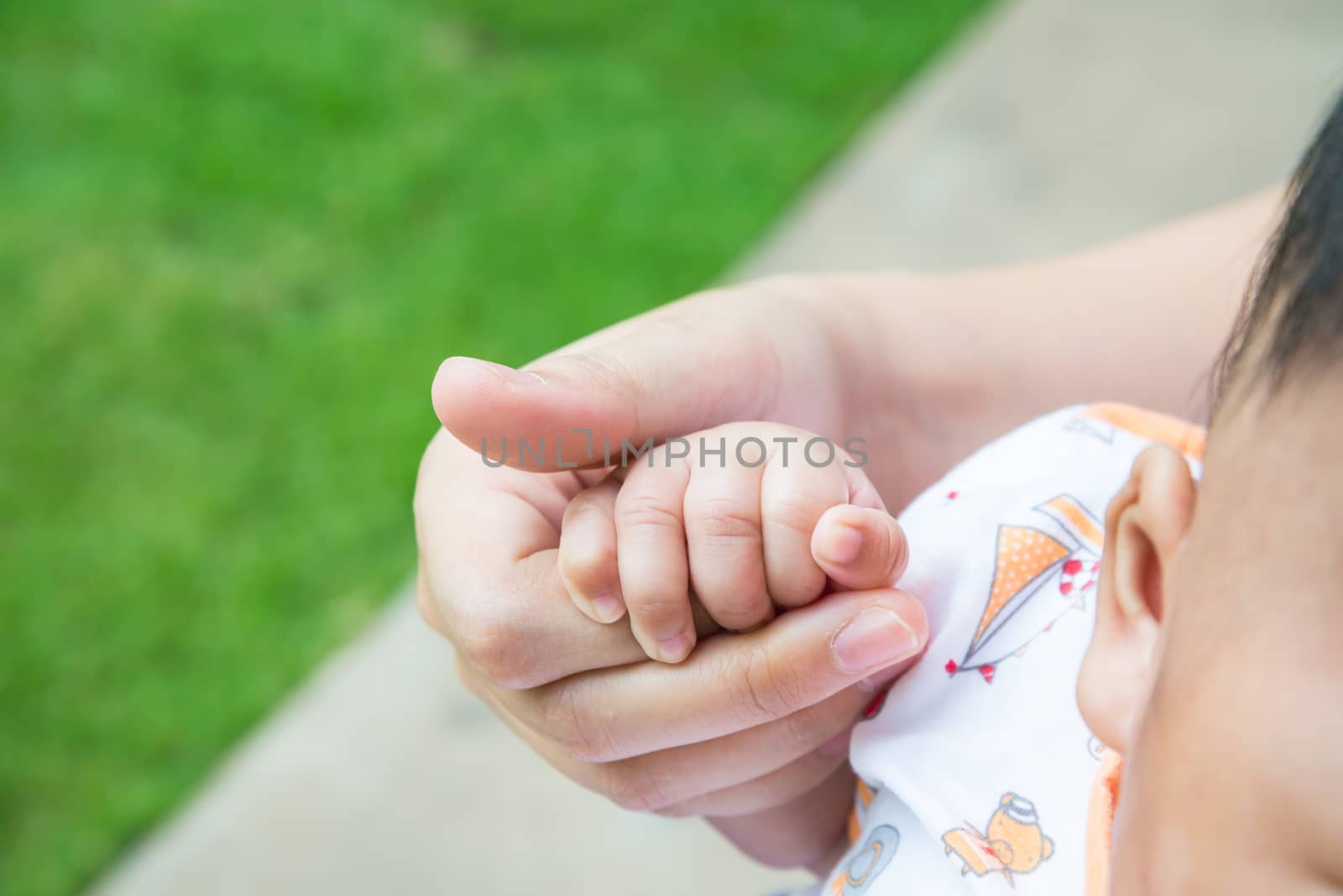A handful of baby's fingers, concept of love and family,sensitive focus