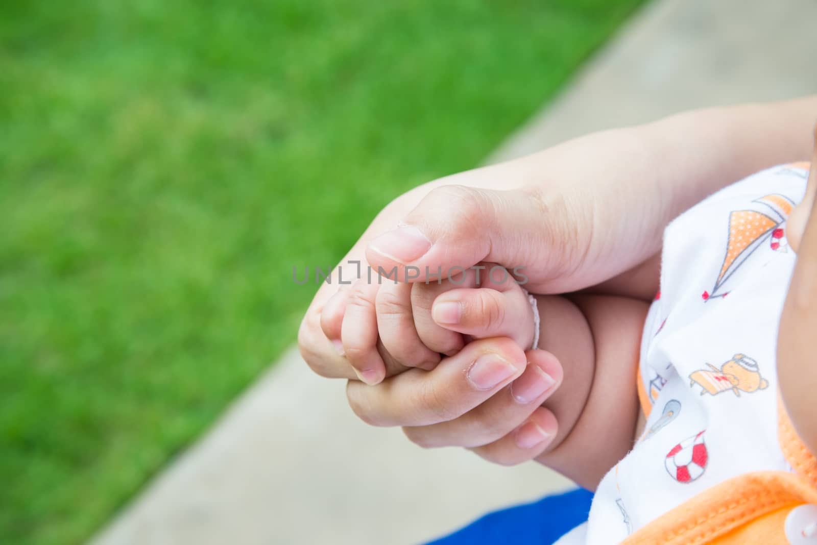 A handful of baby's fingers, concept of love and family,sensitive focus