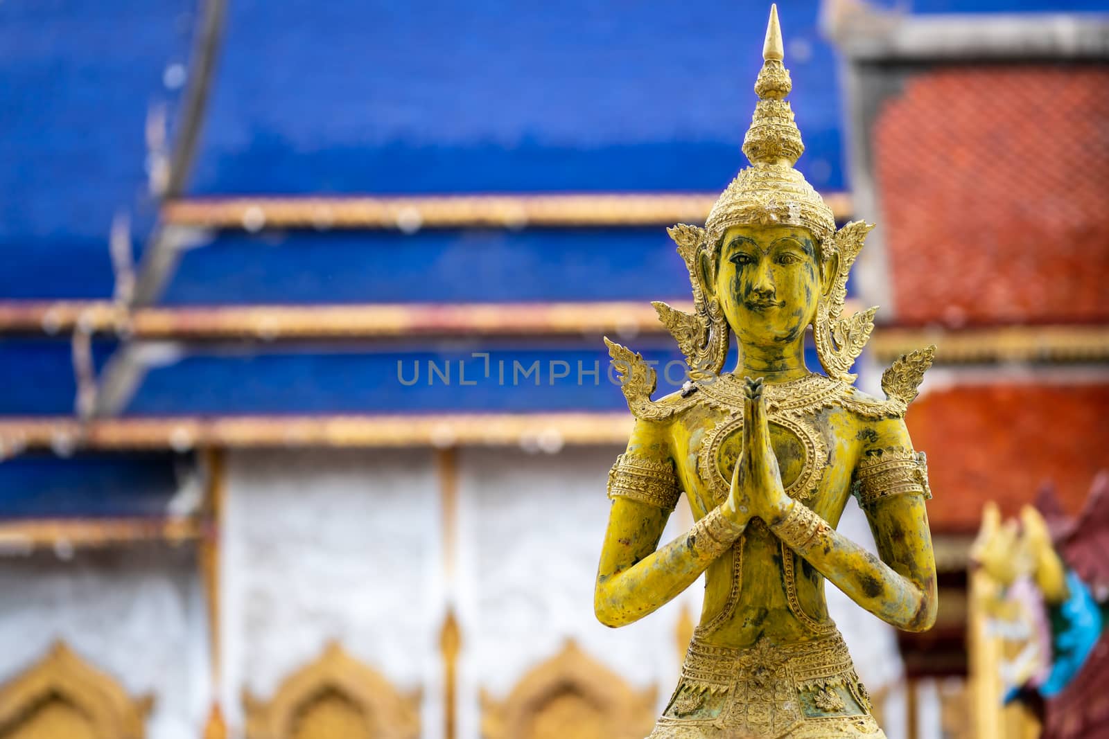 Angels statue to pay respect at Chiang Mai Thailand temple. Conc by SaitanSainam