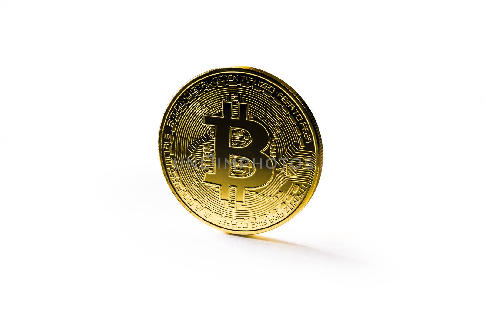 Golden Bitcoin coin on white background. Cryptocurrency. by butenkow