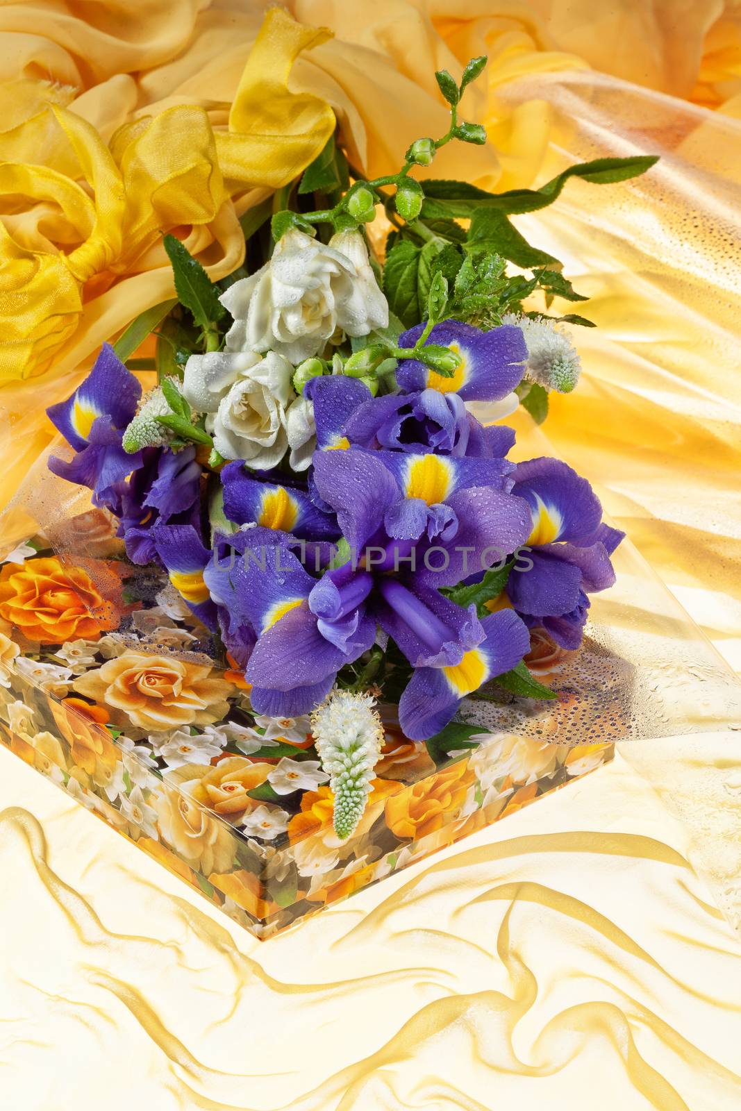 Bouquet of flowers on a fabric background