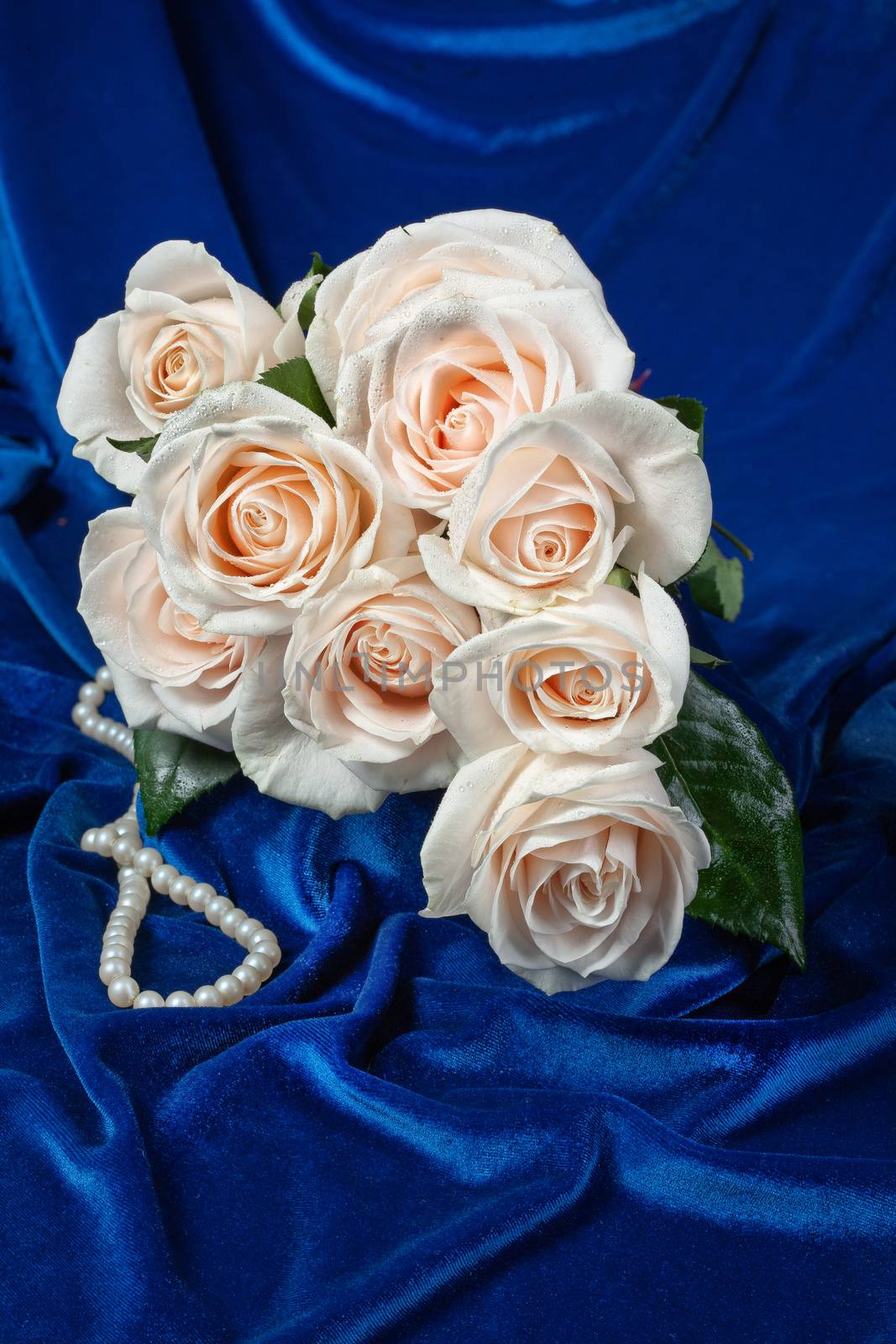 Bouquet of flowers on a fabric background