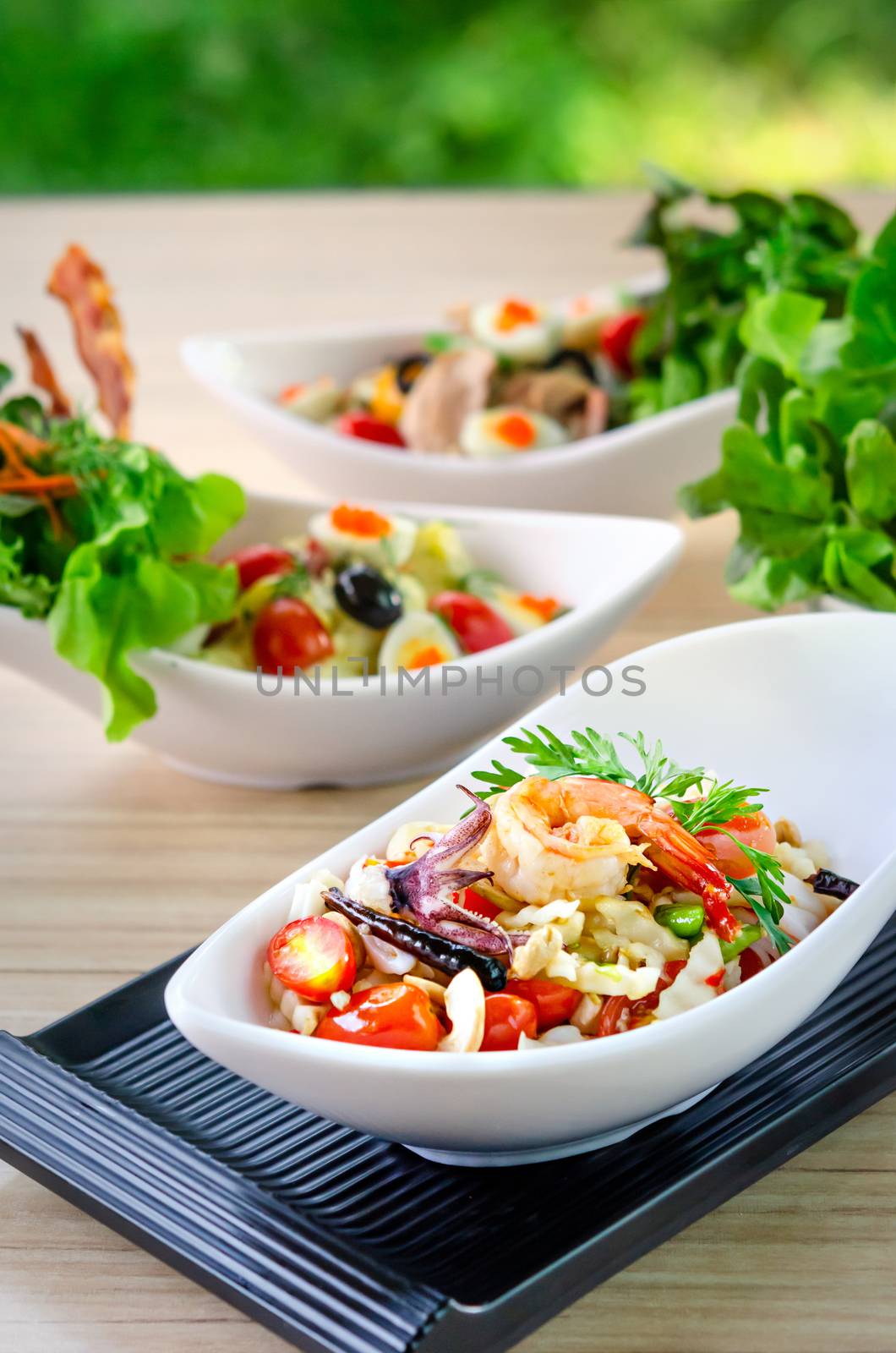 close up fresh vegetable spicy salad with seafood , Healthy nutrition lifestyle food