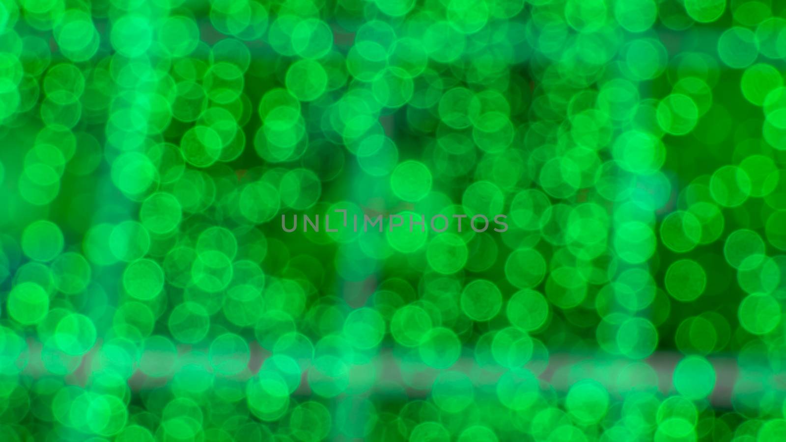 Abstract  green color  with bokeh defocused lights background