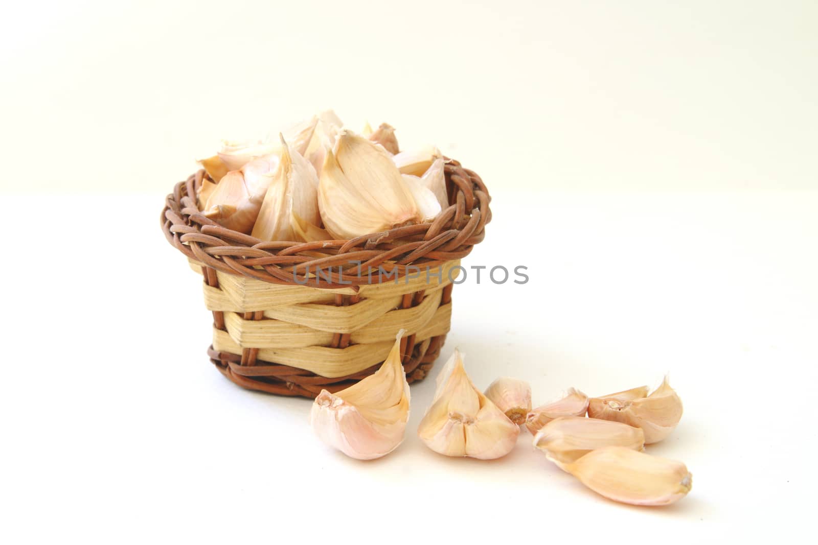 garlic pieces in small basket.