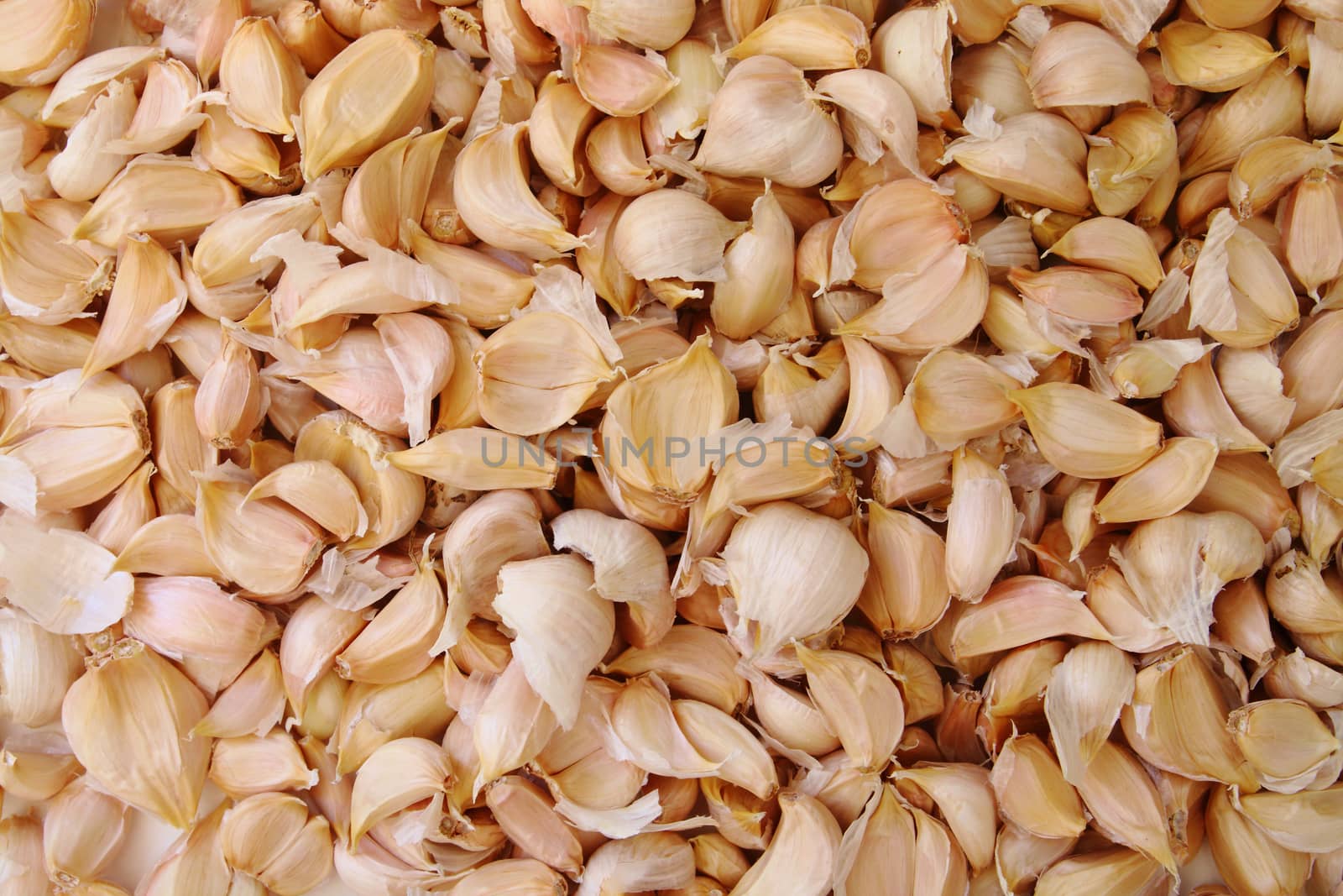 image of garlic pieces .