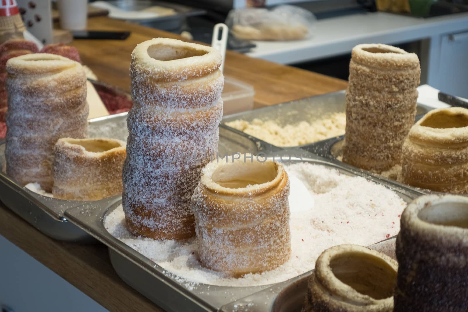 Hungarian and Czech Twist Roll. Hungarian "Kurtoskalacs ", Czech "Kurtos" prepared on the grill, at a traditional street food market.