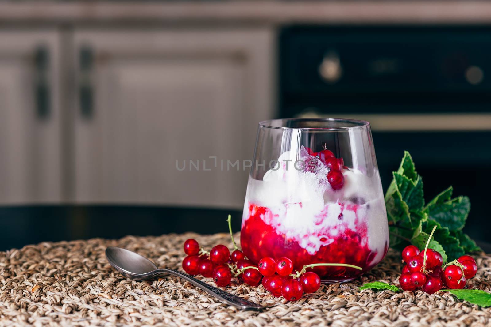 Ice Cream Dessert with Red Currant Jam and Fresh Berries.