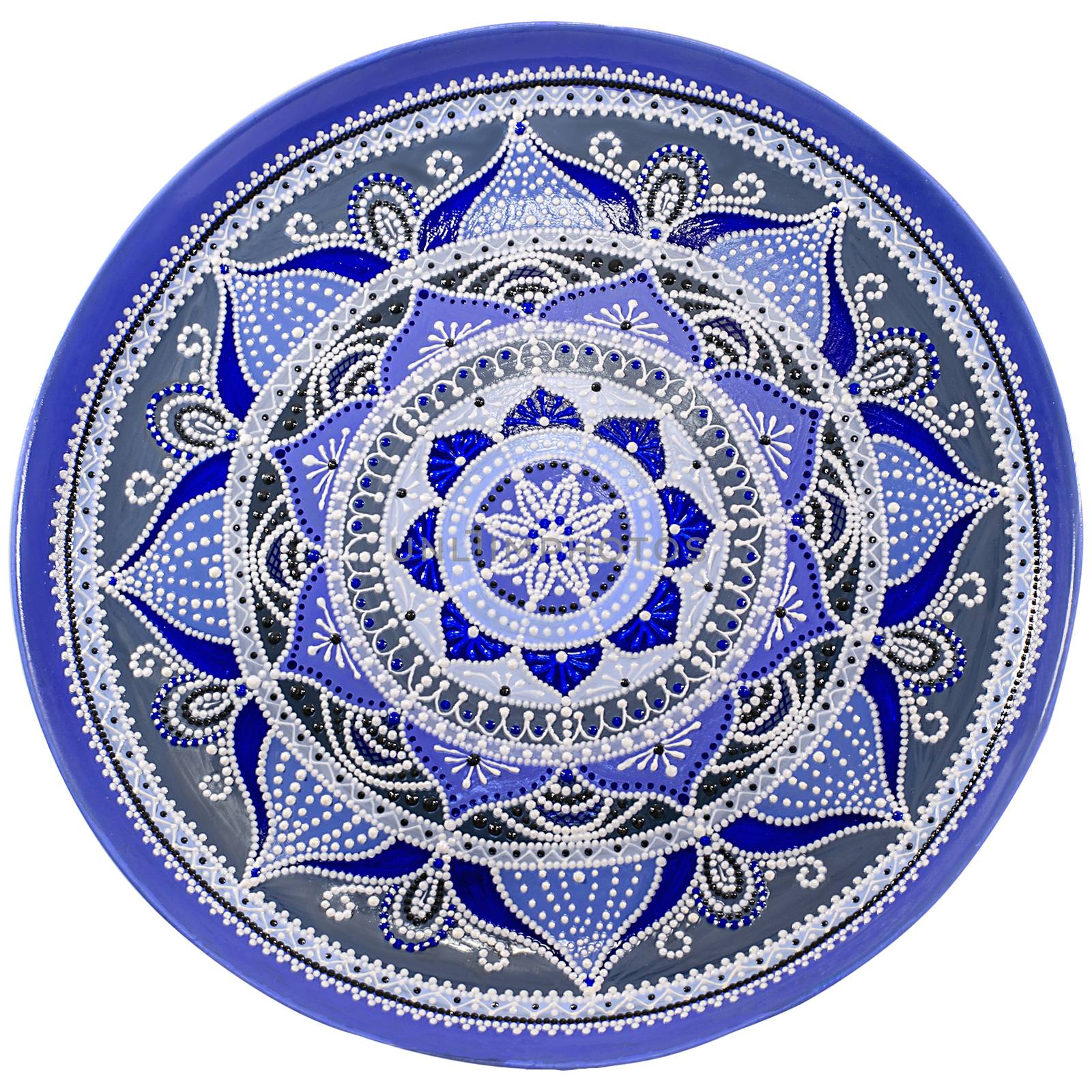 Decorative ceramic dish painted with hands. Art, handmade. Pattern mandala