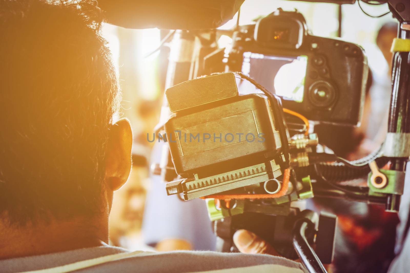 Film industry. Filming with professional camera background