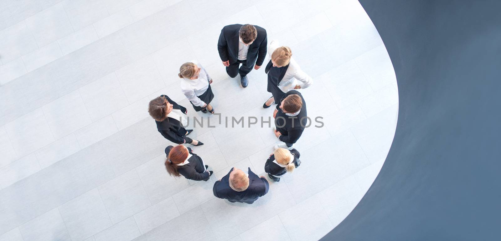 Aerial top view of business people team forming circle, copy space for text