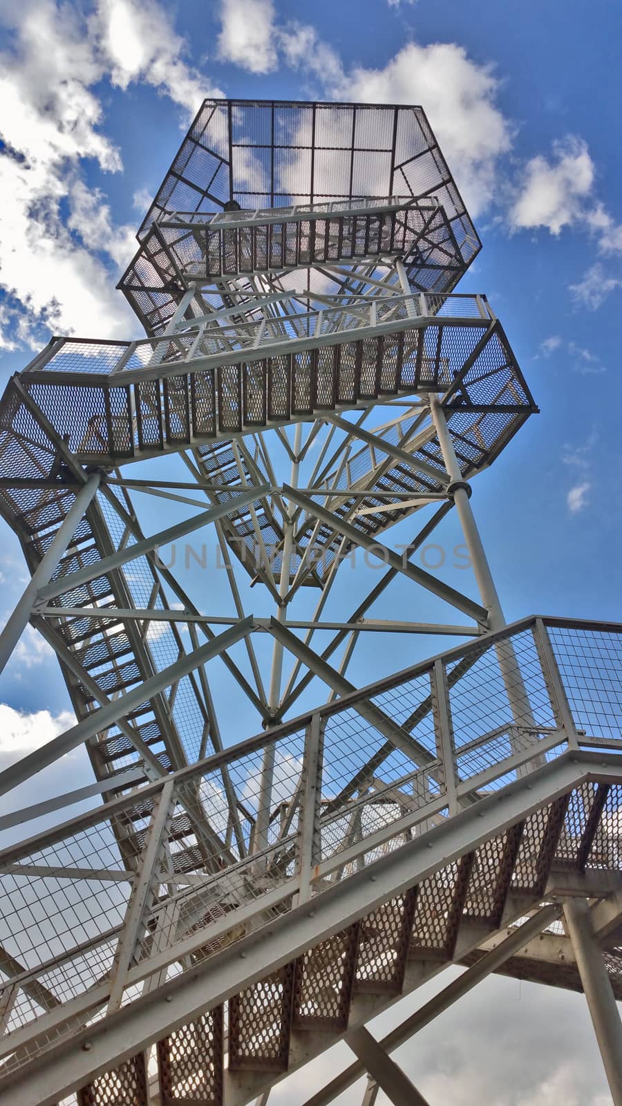 View from below through the metal grill on the tower