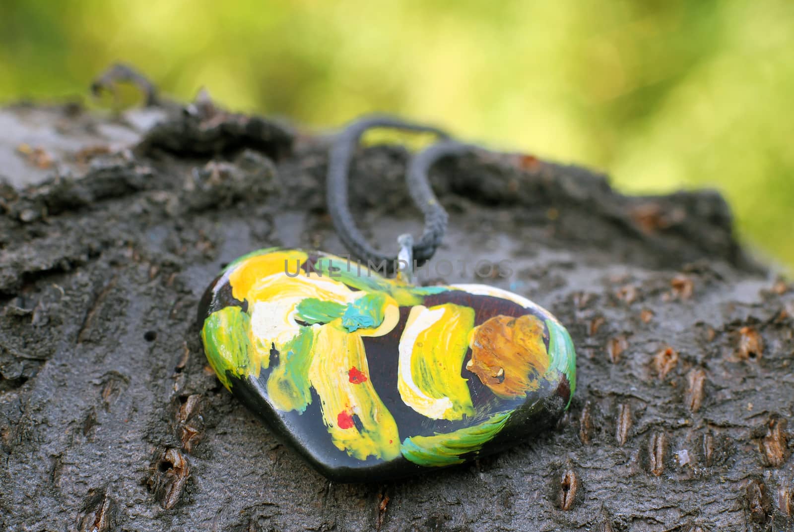 Beautiful hand made polymer clay heart pendant