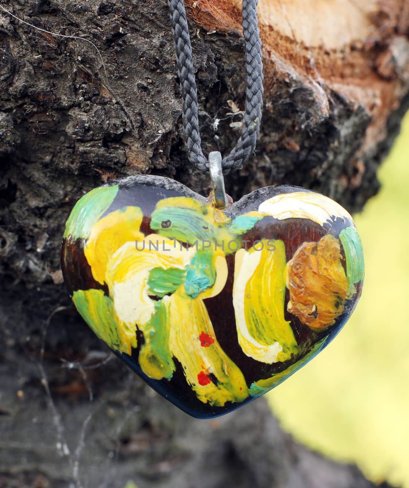 a Beautiful hand made polymer clay heart pendant