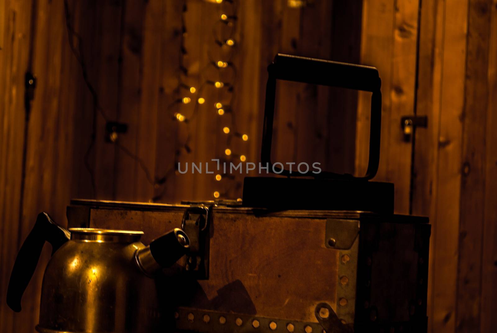 Bokeh of a box, kettle and iron