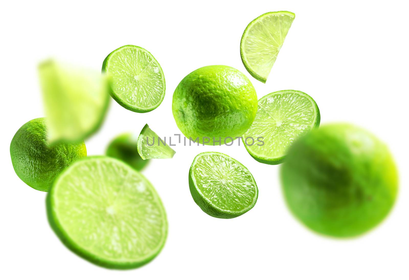 green lime levitated on a white background.