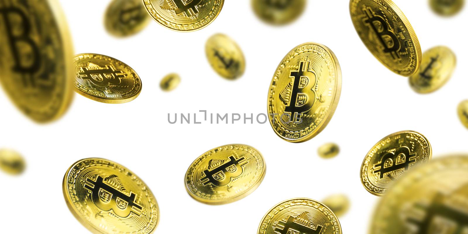 Gold Bitcoin coins flying on a white background.