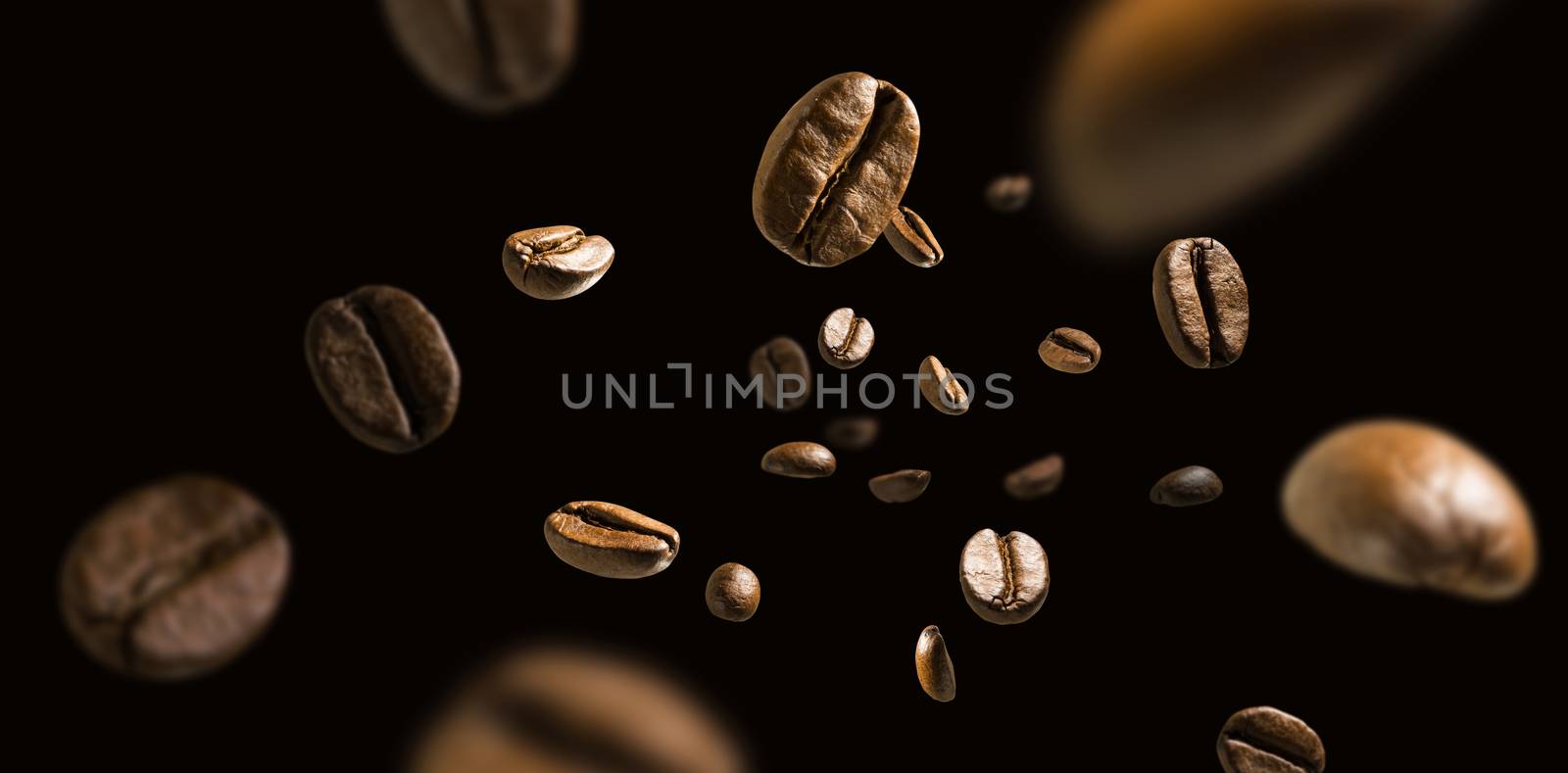 Coffee beans in flight on a dark background by butenkow