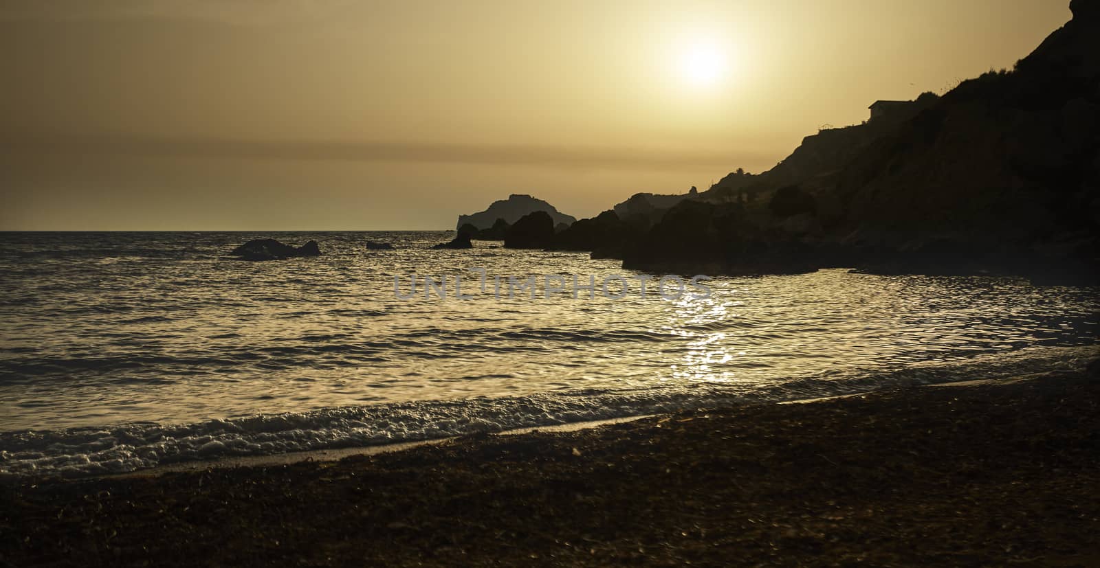 View of Cala Paradiso beach in Sicily during sunset