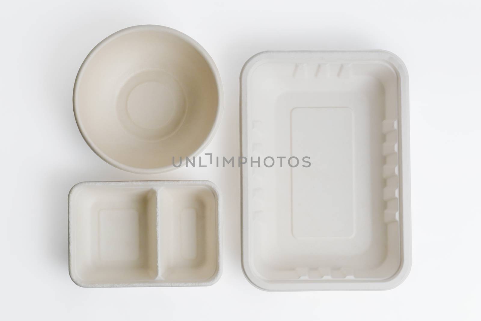 Top view of unbleached plant fiber food box isolated on white with clipping path, Natural fiber eco food box.
