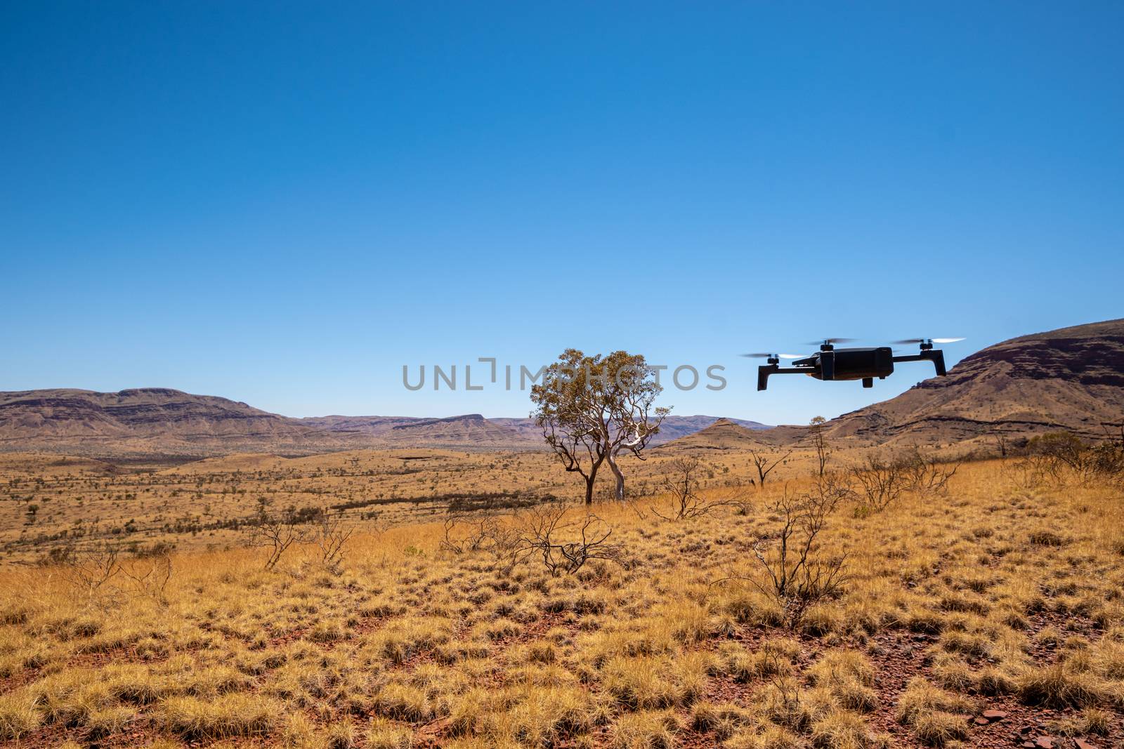 Drone hovering over landscape at Karijini National Park at Mount Bruce Australia