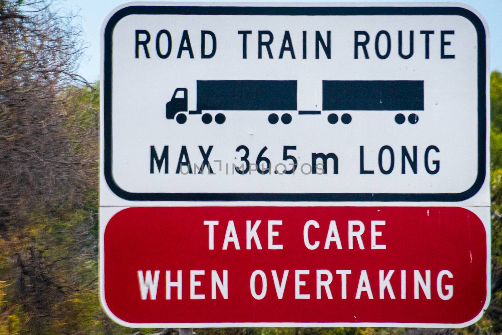 Road Train Route max length 36,5 meters Take Care When Overtaking street sign in Australia by MXW_Stock