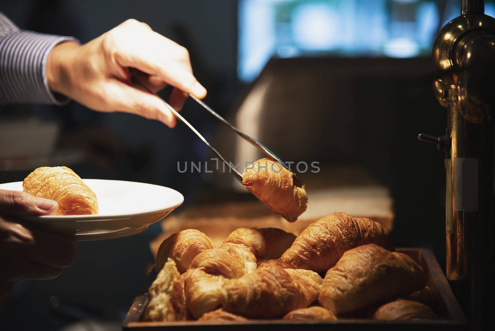 Business man eat the American breakfast set in a hotel - people take a breakfast in hotel concept