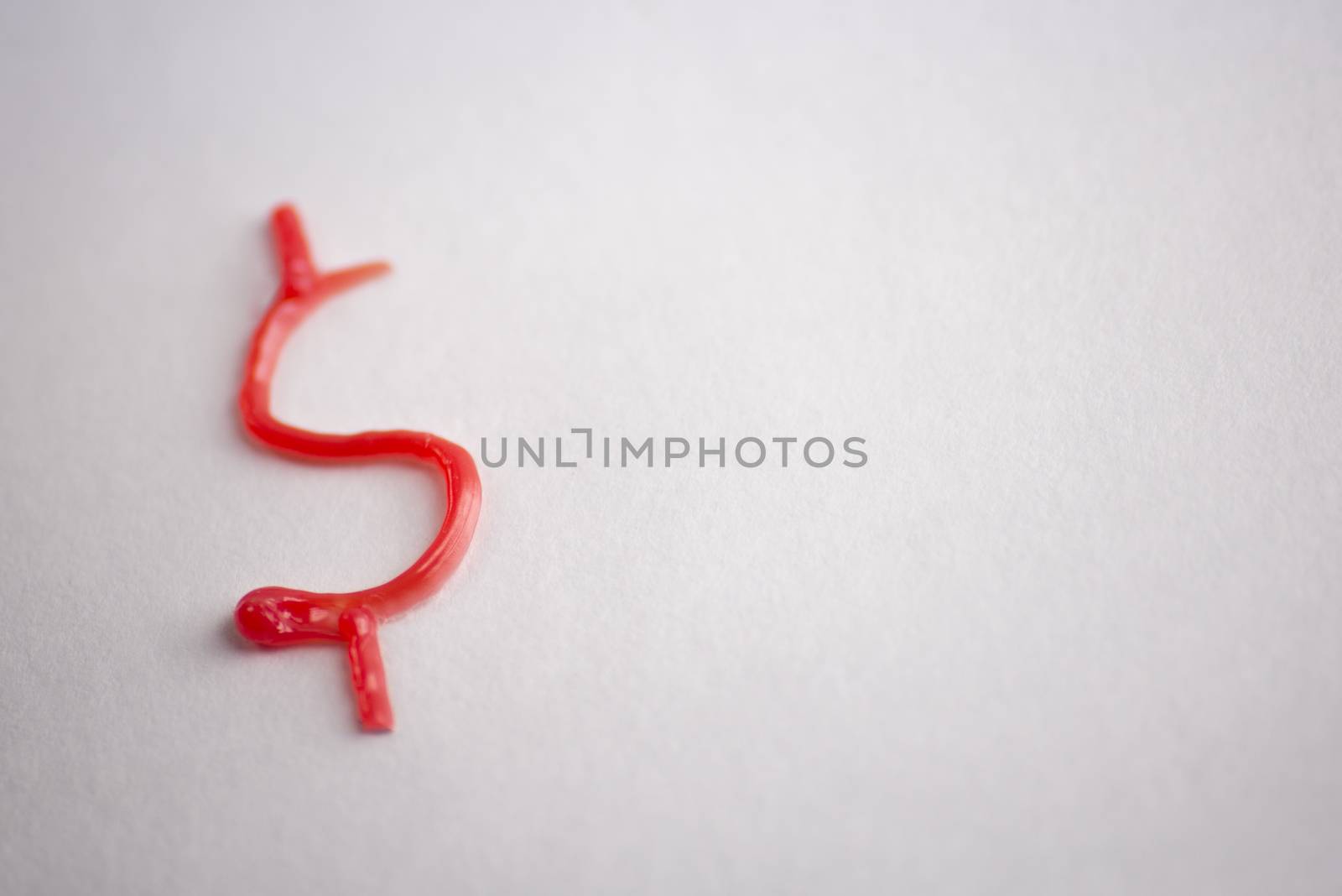 3d red dollar sign on white background