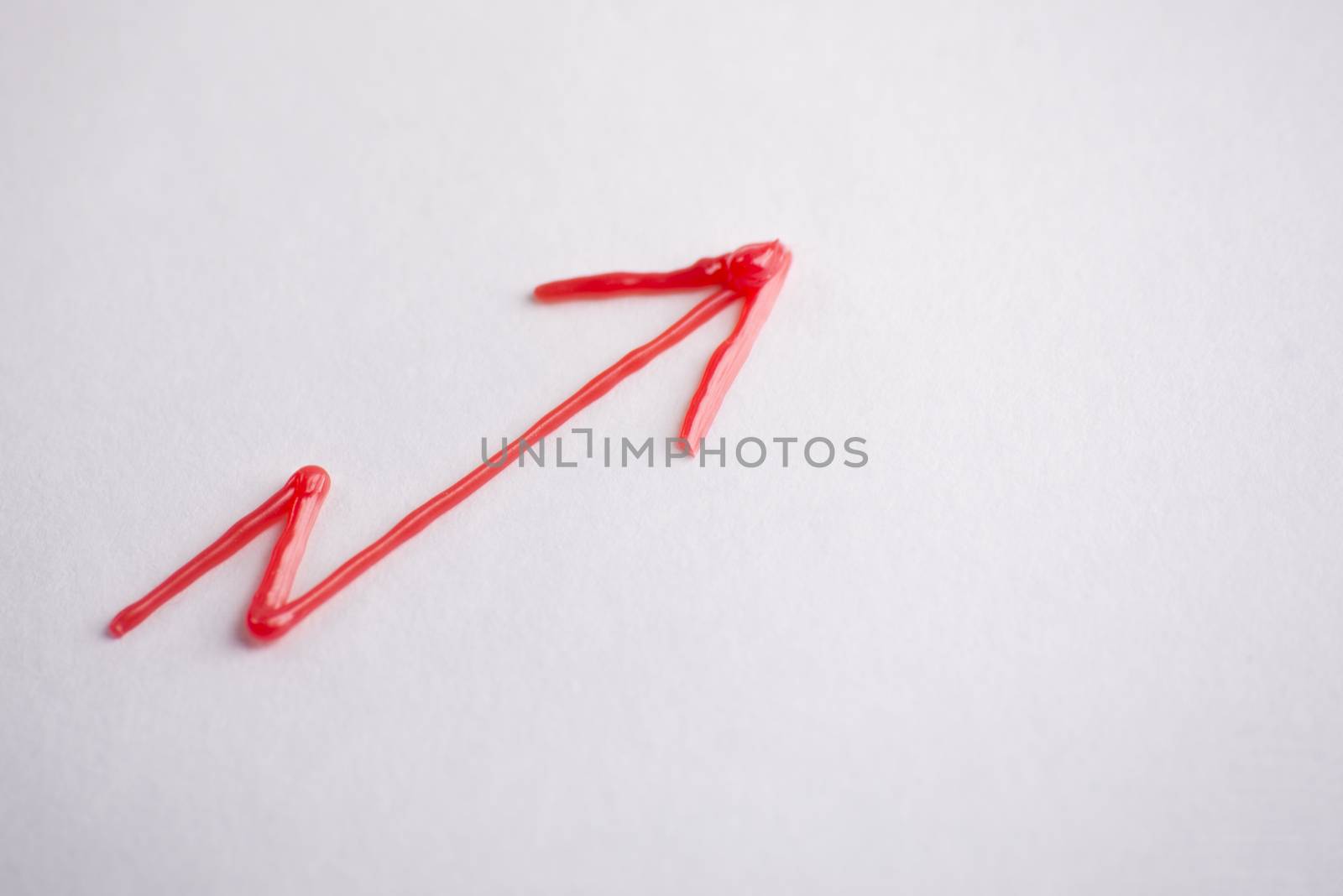 Red arrow on white background. Business chart